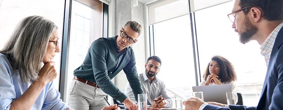 ceo businessman leader with diverse coworkers team